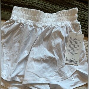 White lululemon “track that” shorts NWT